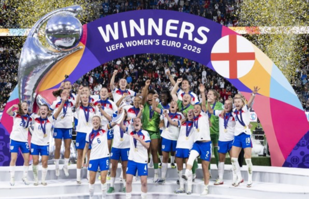 UEFA Women's Euro 2025 winners celebrating in Women's Football with trophy and confetti.
