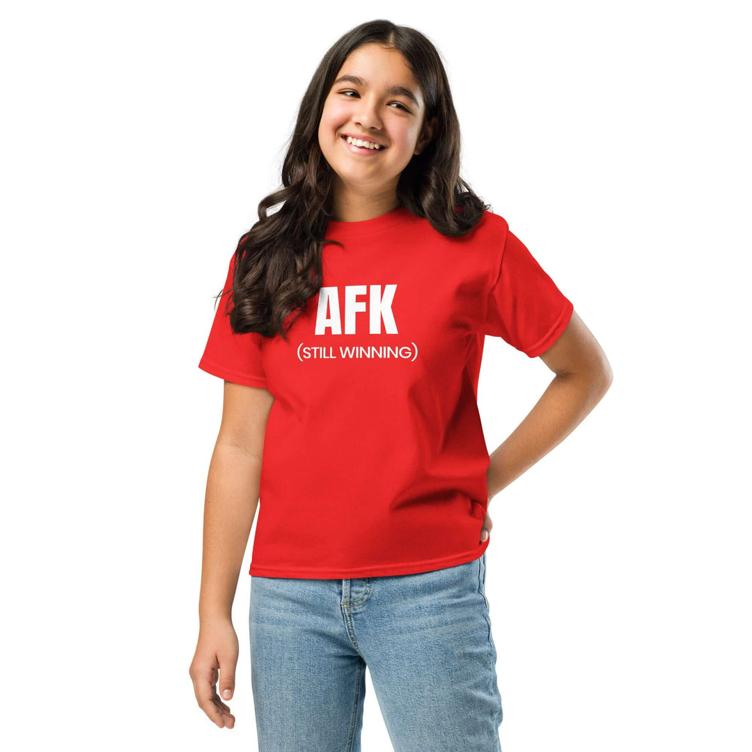 AFK Youth classic tee worn by a smiling girl in red, showcasing comfort and style for kids.