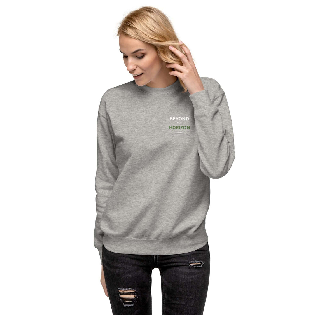 Beyond the Horizon Unisex Premium Sweatshirt showcasing a woman wearing a stylish grey sweatshirt.