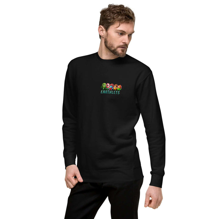Earthlets Unisex Premium Sweatshirt on model, featuring colorful logo on black fabric, perfect for casual wear.