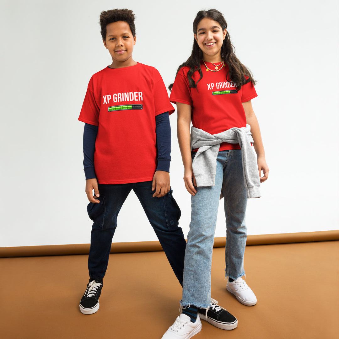 XP Grinder Youth classic tee worn by kids, showcasing comfort and style in a vibrant red color.