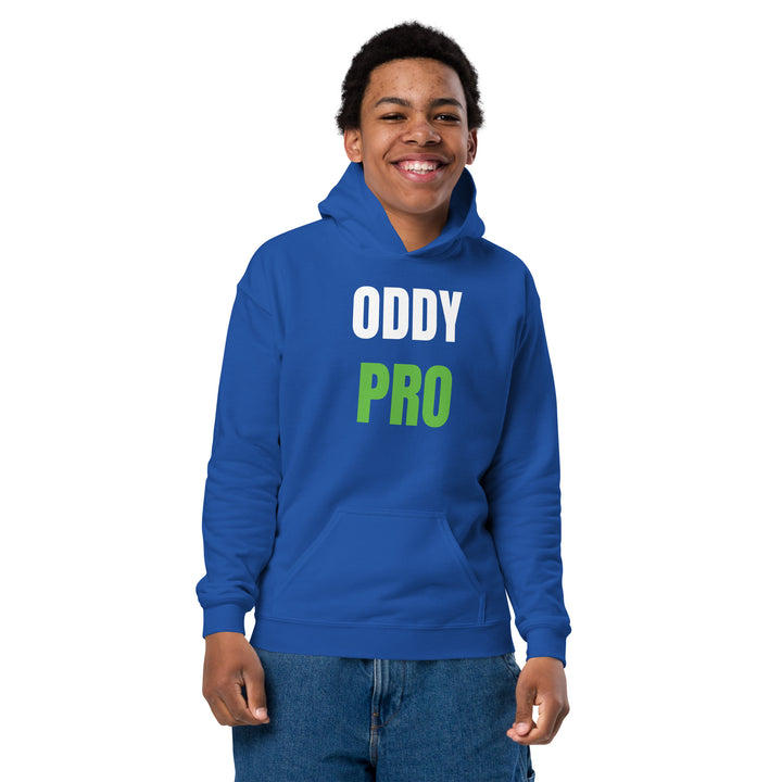 Young boy wearing an Oddy Pro Youth heavy blend hoodie in blue with bold lettering.