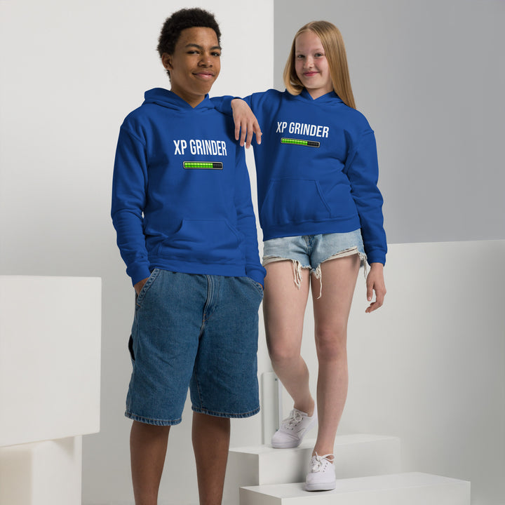 Two children wearing XP Grinder Youth heavy blend hoodie in blue, showcasing comfort and style.