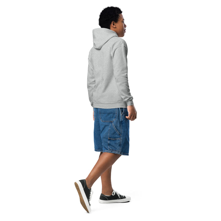 Oddy Pro Youth heavy blend hoodie worn by a child with a gray hoodie and denim shorts, showcasing comfort and style.